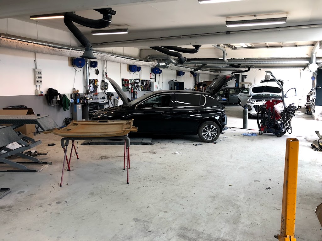 tesla-skadecenter-vaerksted-elkjaergruppen-ballerup-tesla-approved-body-shop-10.jpeg