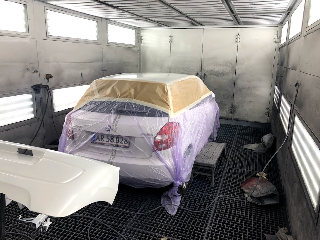 tesla-skadecenter-vaerksted-elkjaergruppen-ballerup-tesla-approved-body-shop-4.jpeg