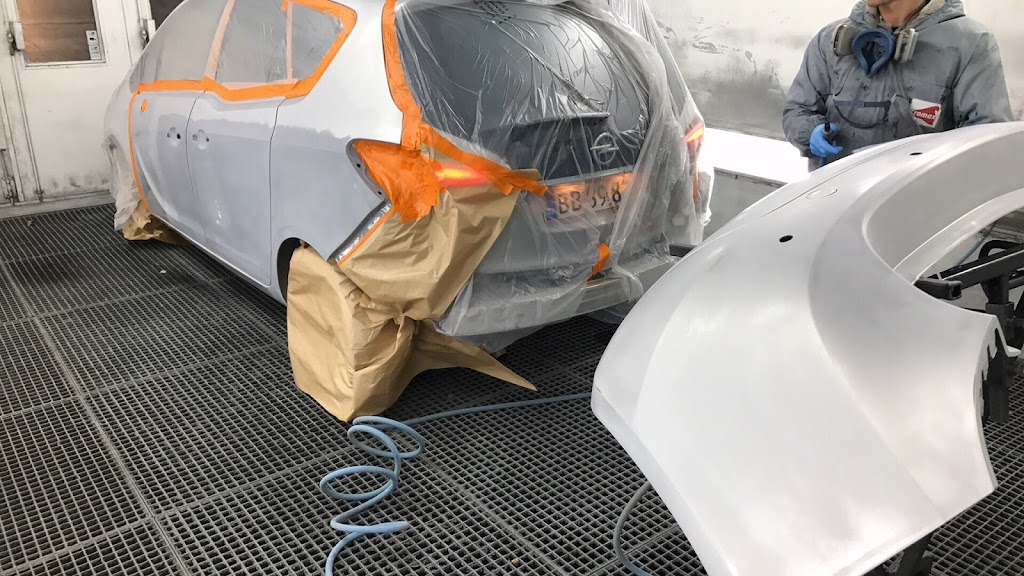 elkjaer-group-tesla-approved-bodyshop-4.jpeg