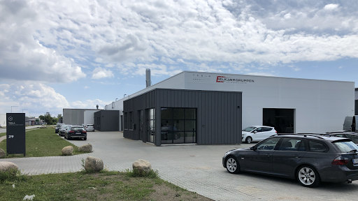 Elkjær Group. Tesla Approved Bodyshop